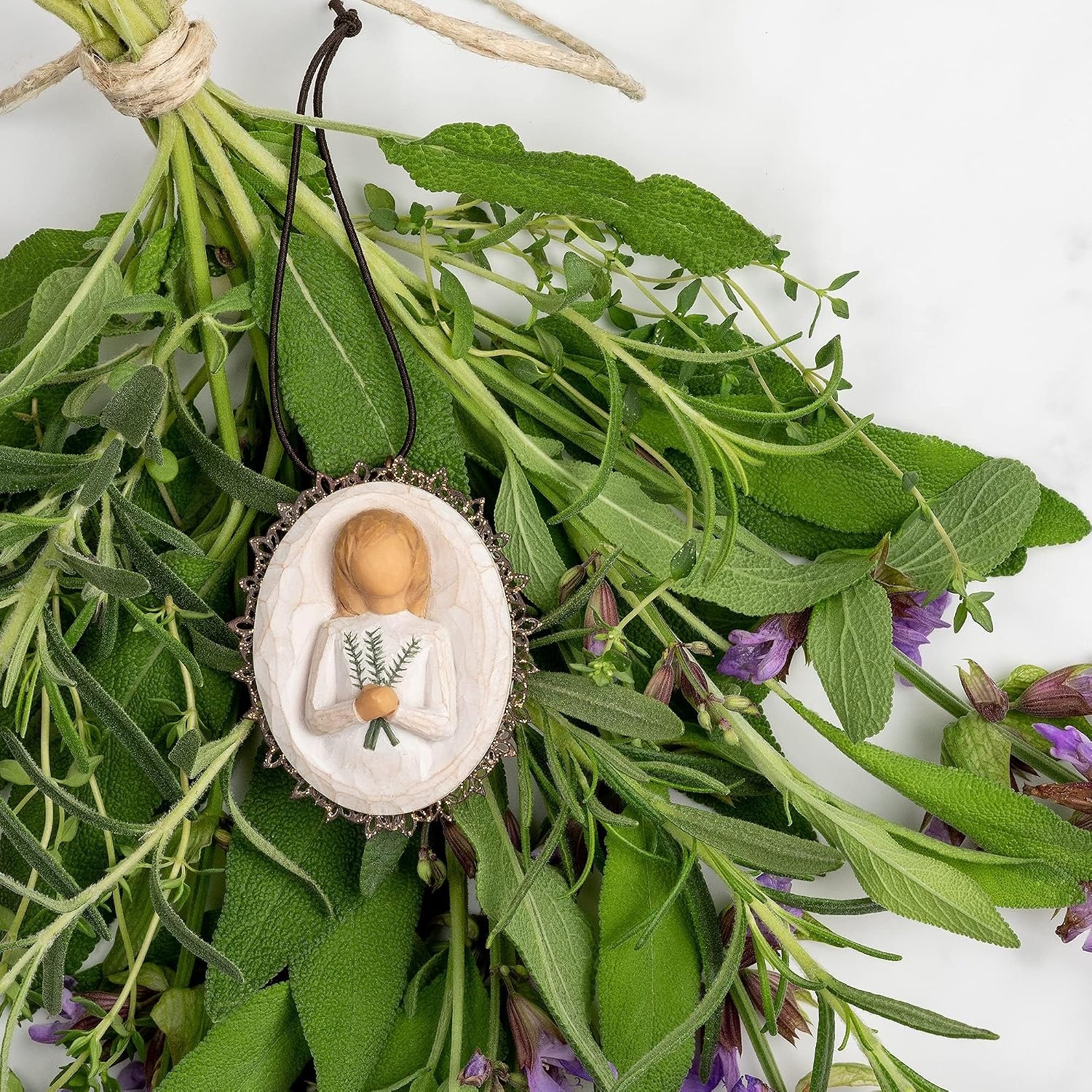 image:imageWillow Tree Remembrance MetalEdged Ornament HandPainted Bas Relief BasRelief Figure Holding Rosemary Rust Filigree Edge Cast from a Susan Lordi Original Carving Ready to HangRemembrance
