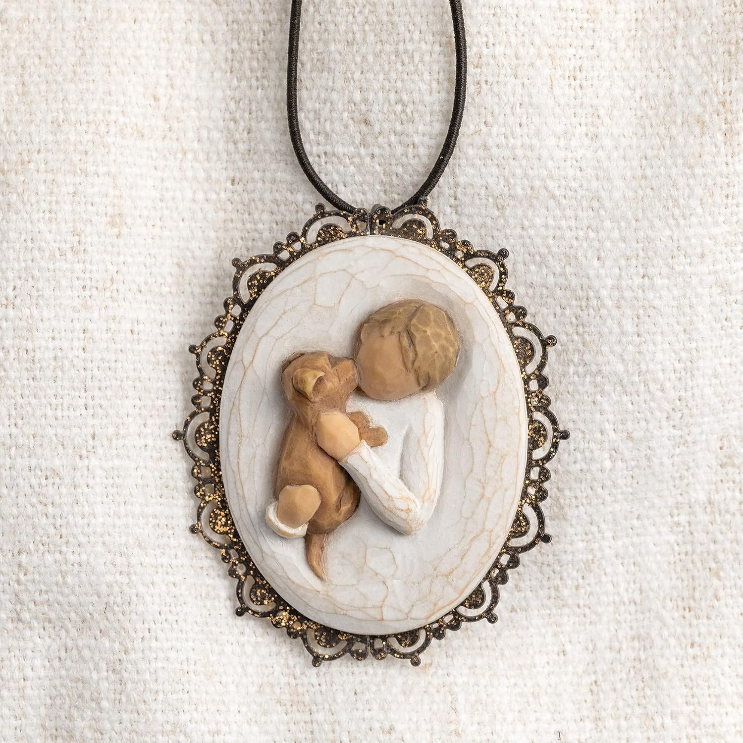 image:imageWillow Tree Remembrance MetalEdged Ornament HandPainted Bas Relief BasRelief Figure Holding Rosemary Rust Filigree Edge Cast from a Susan Lordi Original Carving Ready to HangKindness boy