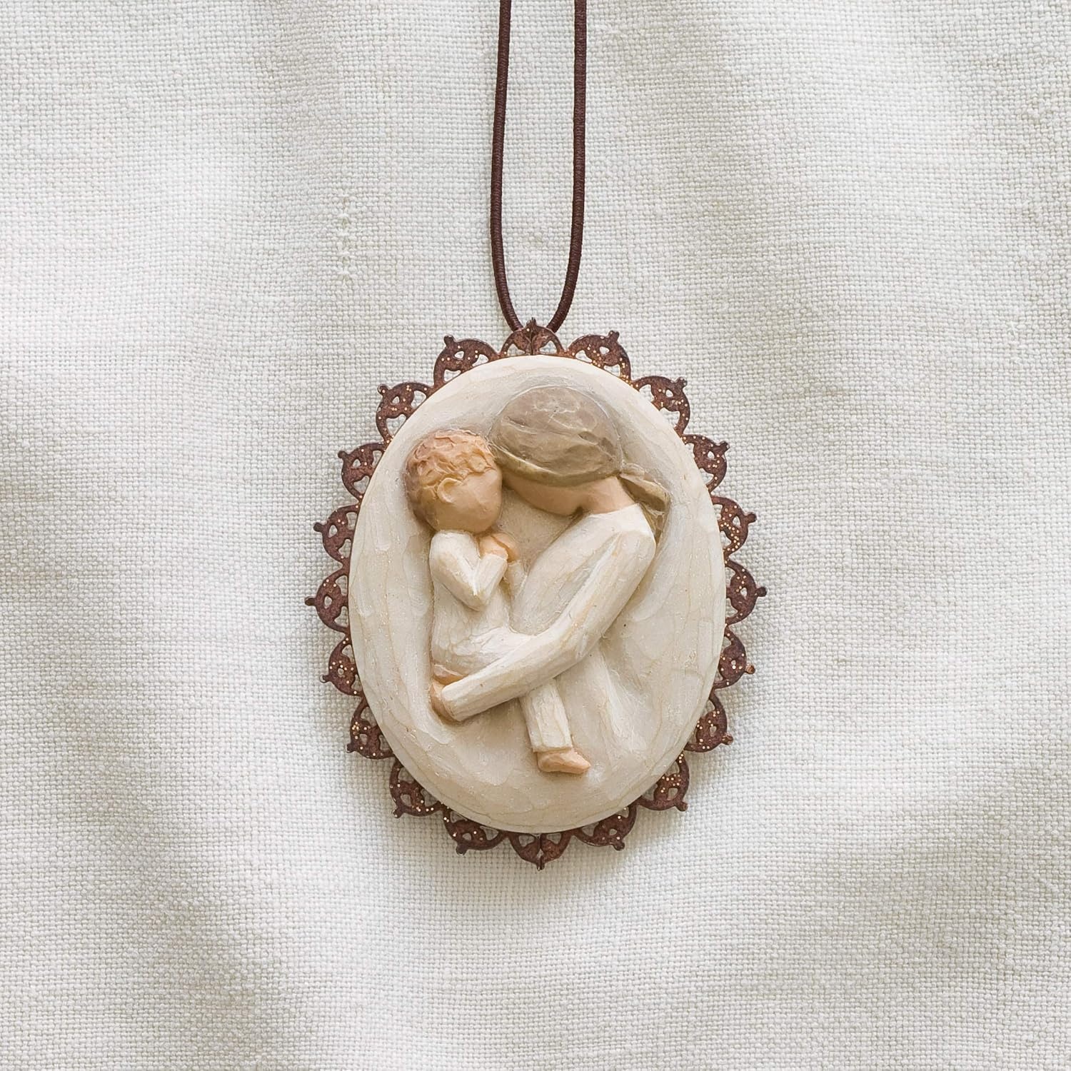 image:imageWillow Tree Remembrance MetalEdged Ornament HandPainted Bas Relief BasRelief Figure Holding Rosemary Rust Filigree Edge Cast from a Susan Lordi Original Carving Ready to HangTenderness