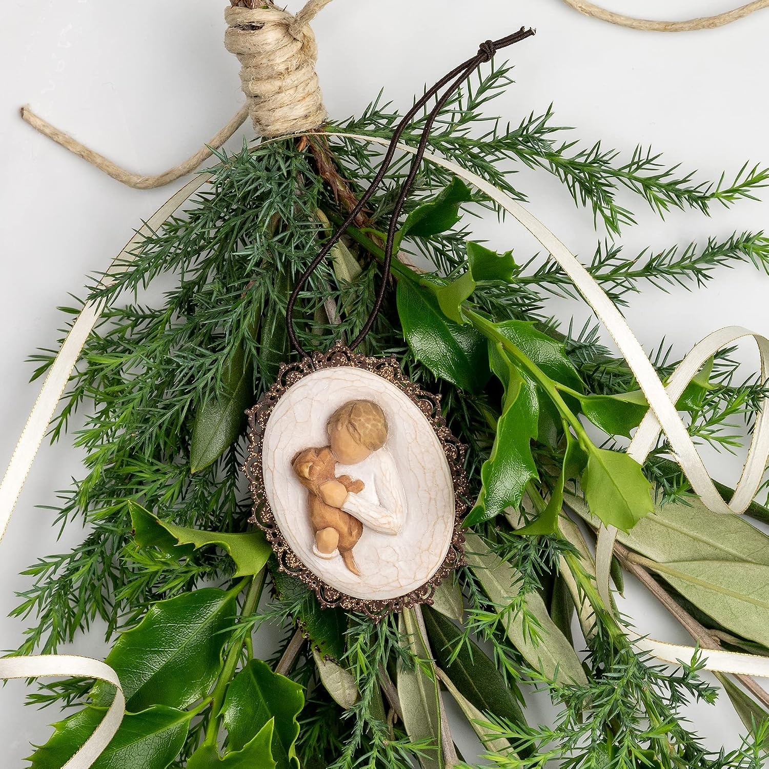 image:imageWillow Tree Remembrance MetalEdged Ornament HandPainted Bas Relief BasRelief Figure Holding Rosemary Rust Filigree Edge Cast from a Susan Lordi Original Carving Ready to HangKindness boy