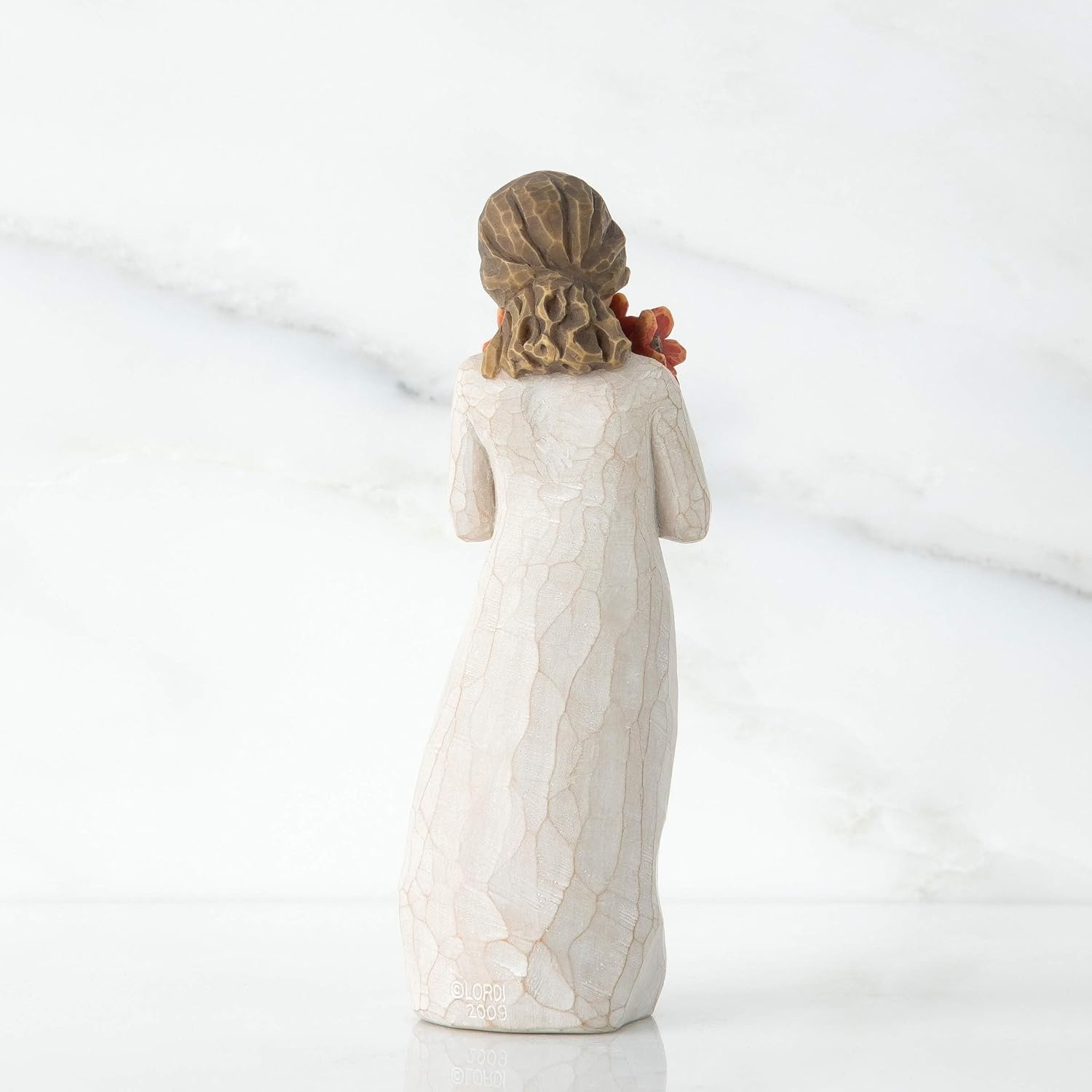 image:imageWillow Tree Surrounded by Love Sculpted HandPainted Figure Cast from a Susan Lordi Original Carving Gift Expressing Love and Caring Includes Enclosure Card Display on MantelRedorange Flowers